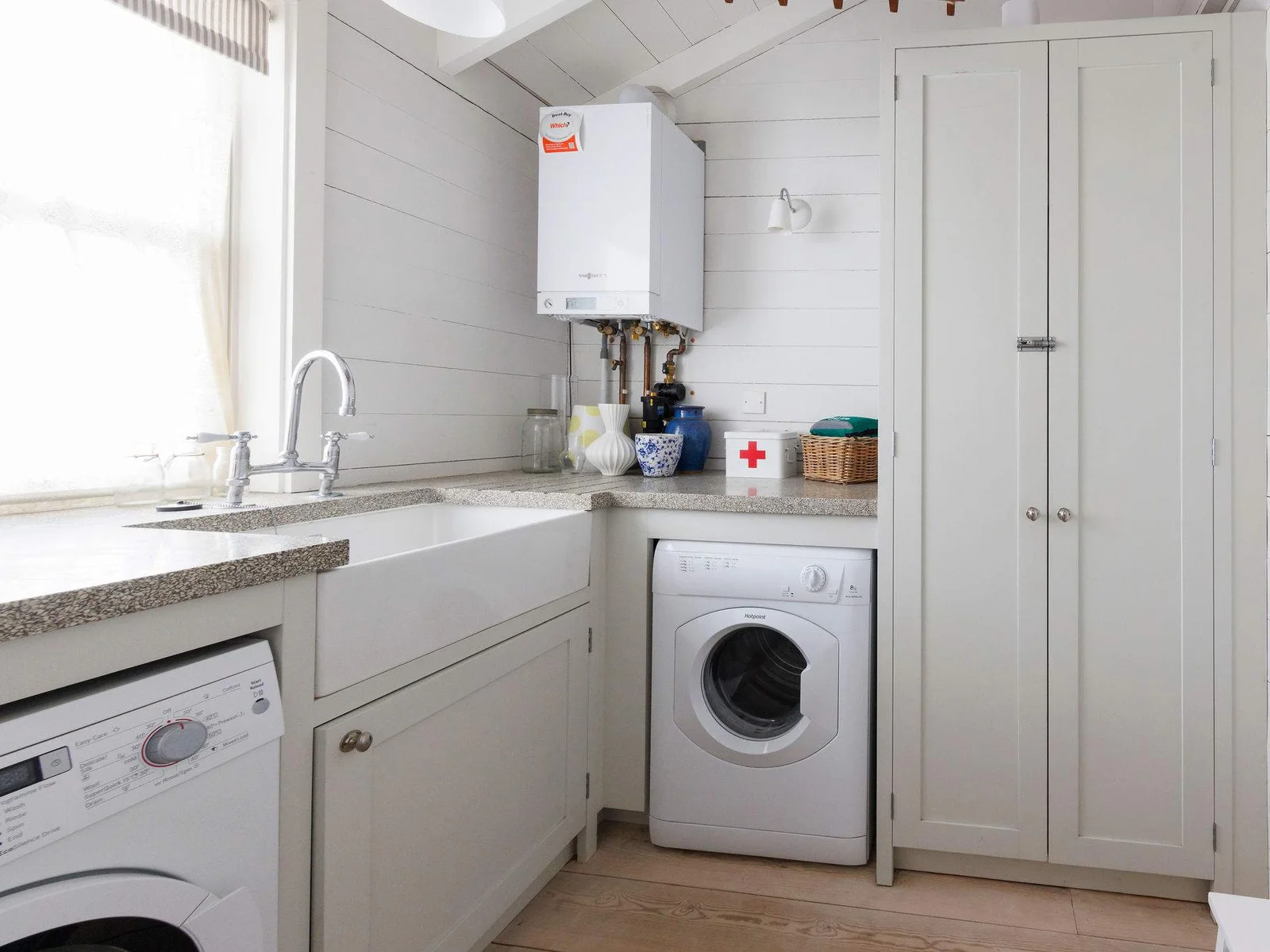 The handy utility with washer, dryer and butlers sink