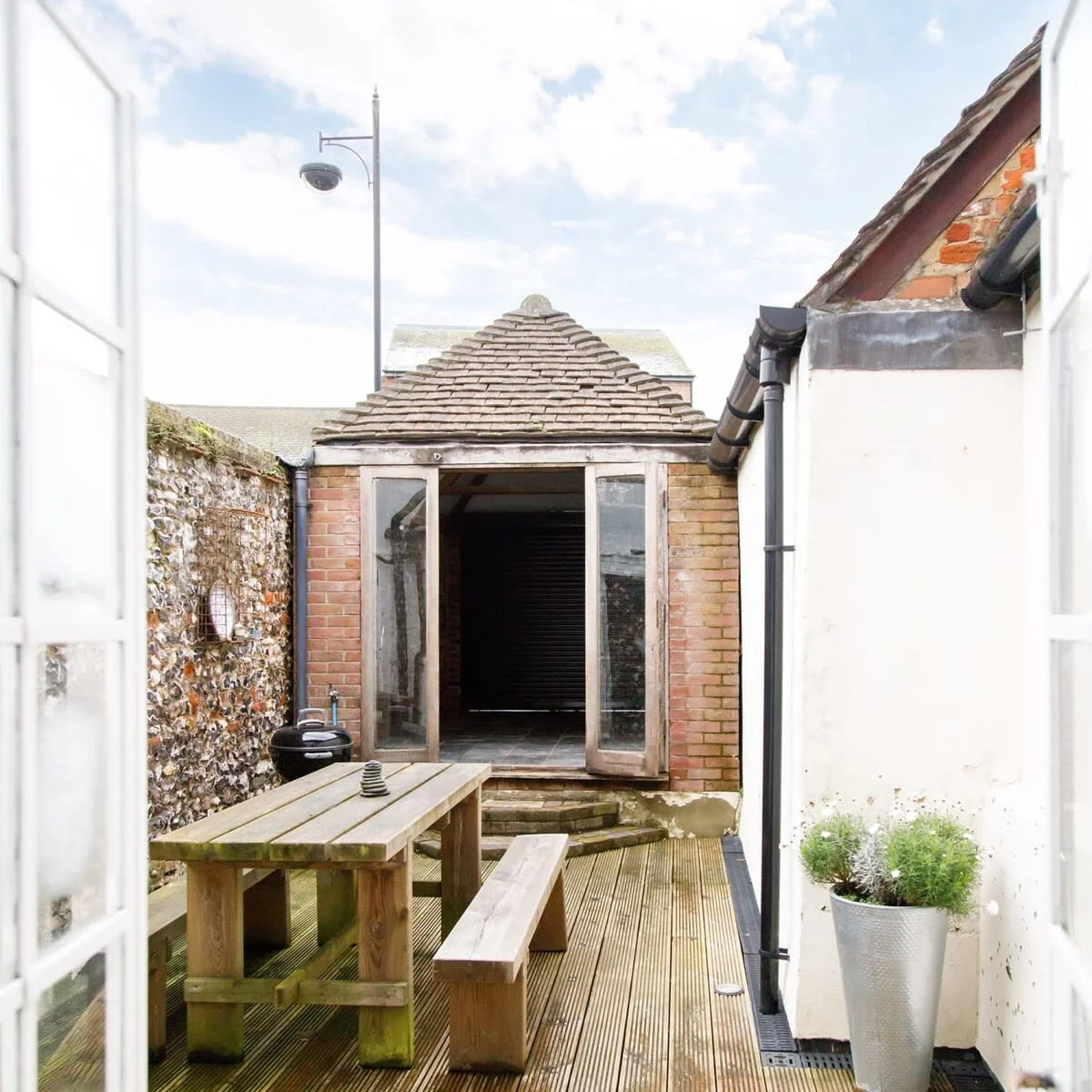 On warmer days, open up the patio doors to your own private courtyard. The perfect spot for a cup of tea or an evening drink.