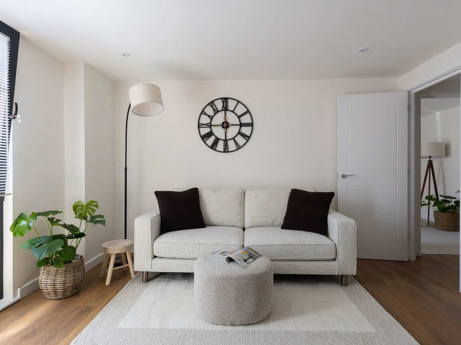 Bright and inviting lounge with comfortable seating, ideal for relaxing after exploring Chichester.