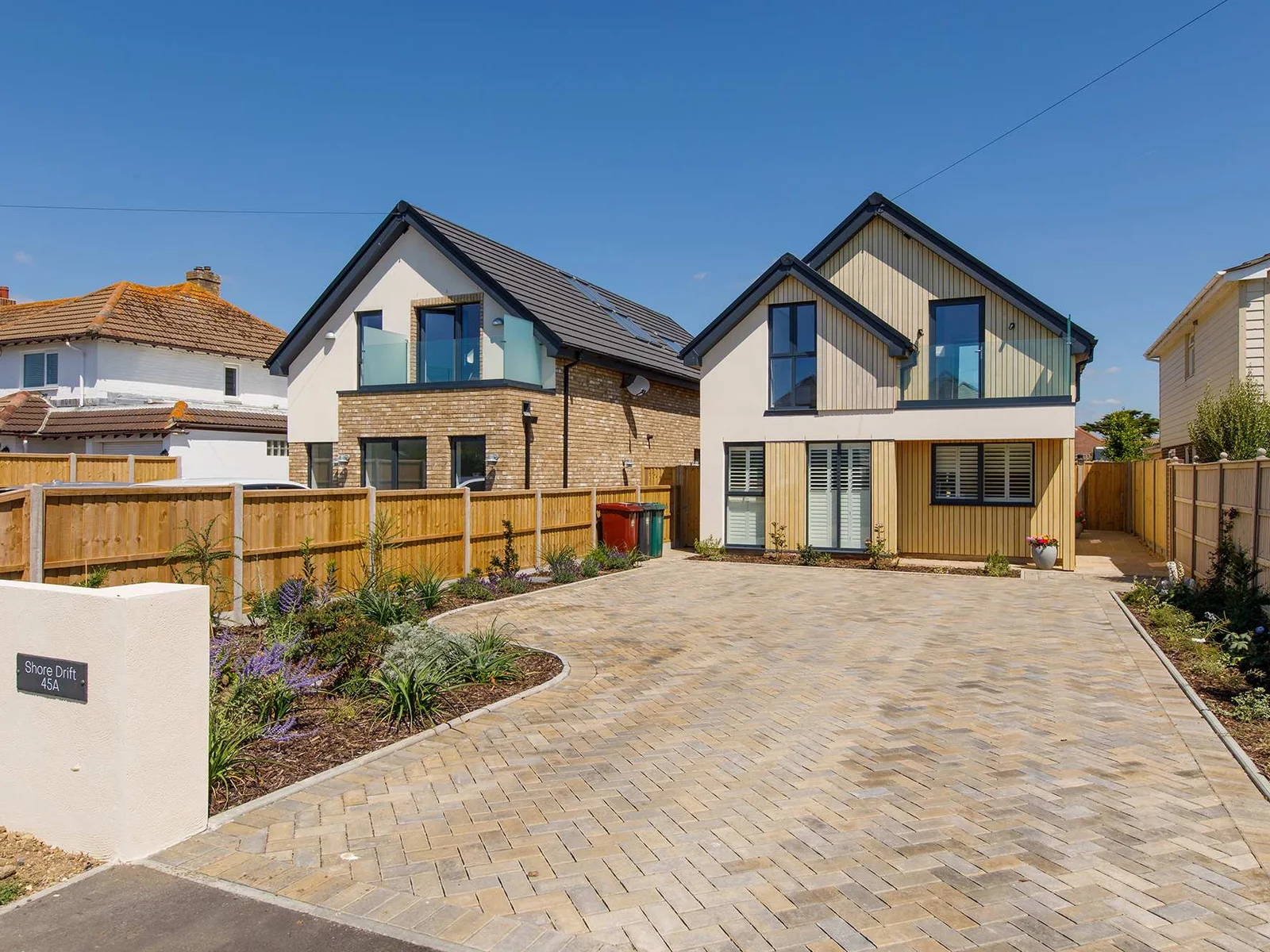 The newly built home has a large driveway to comfortably park 3/4 cars.