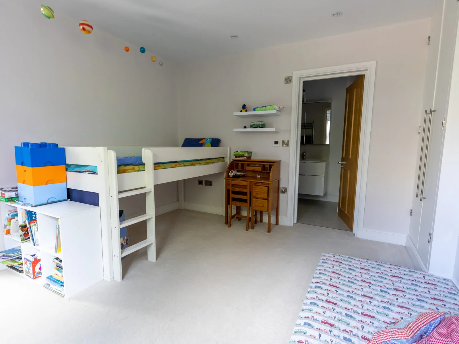 Spacious children’s bedroom with bunk bed, desk and plenty of room to play.