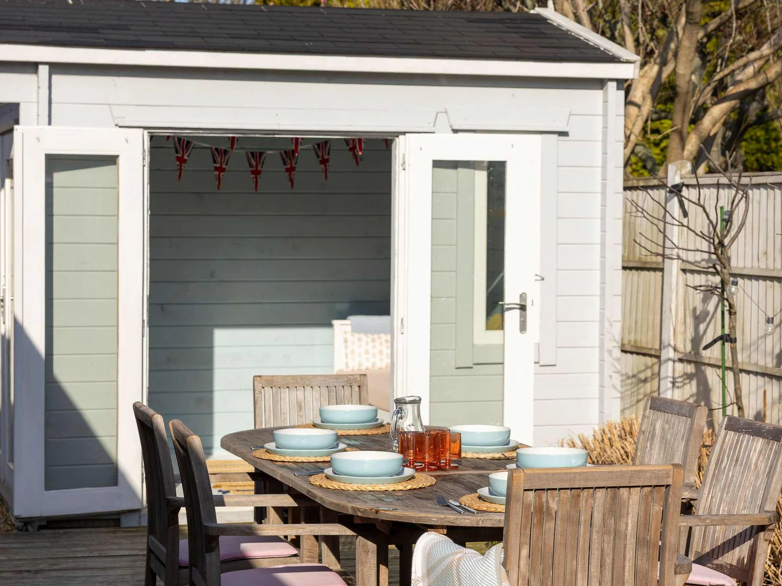 Dine al fresco on the deck with seating for six, right outside the summerhouse and perfect for enjoying BBQ meals.