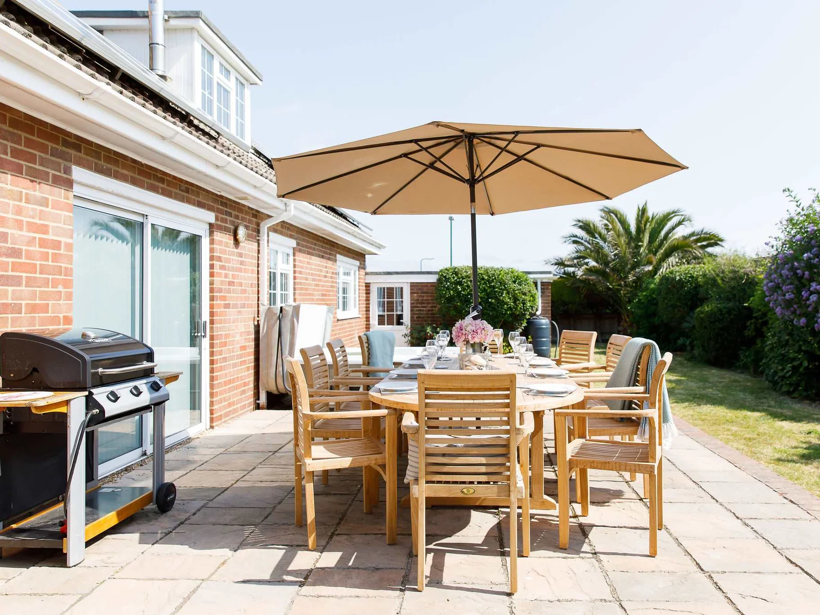 The home has a gas BBQ and dining furniture for 10.
