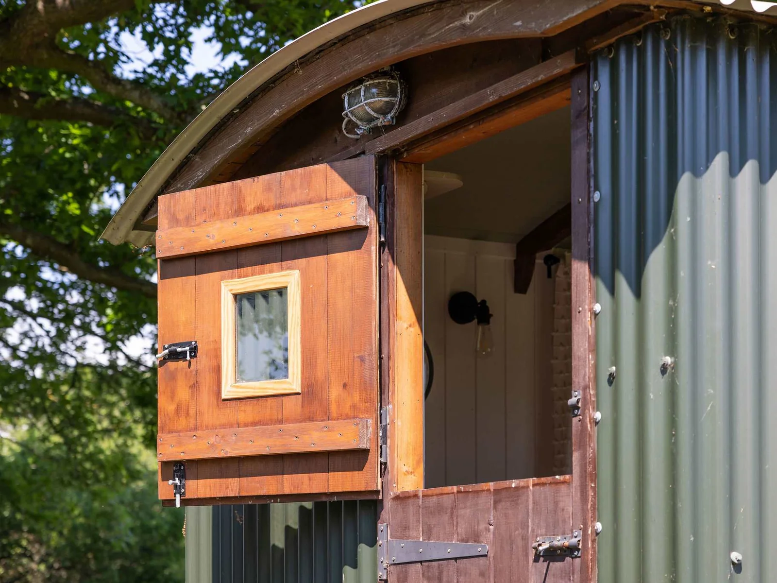 Swing open the barn style door and welcome the fresh air