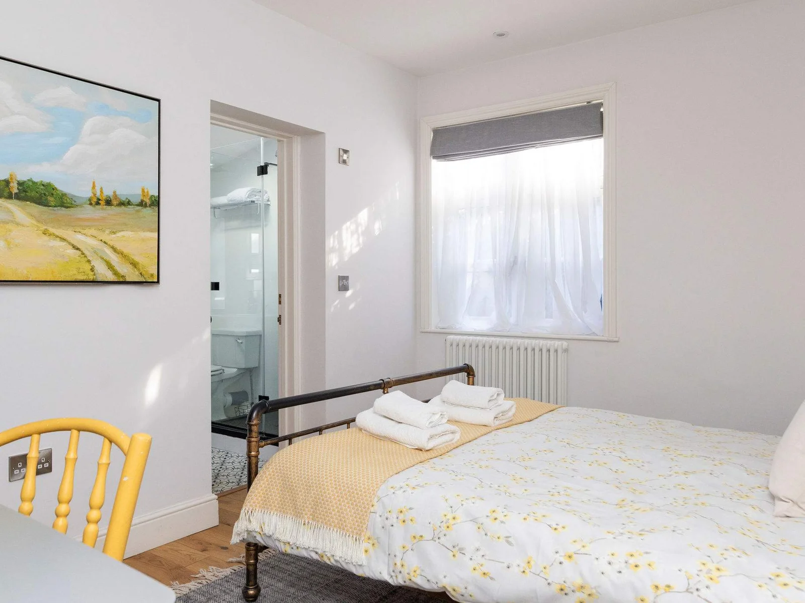 Bedroom 1 This cosy bedroom offers a comfortable king size bed with fresh linens and easy access to the en-suite bathroom.