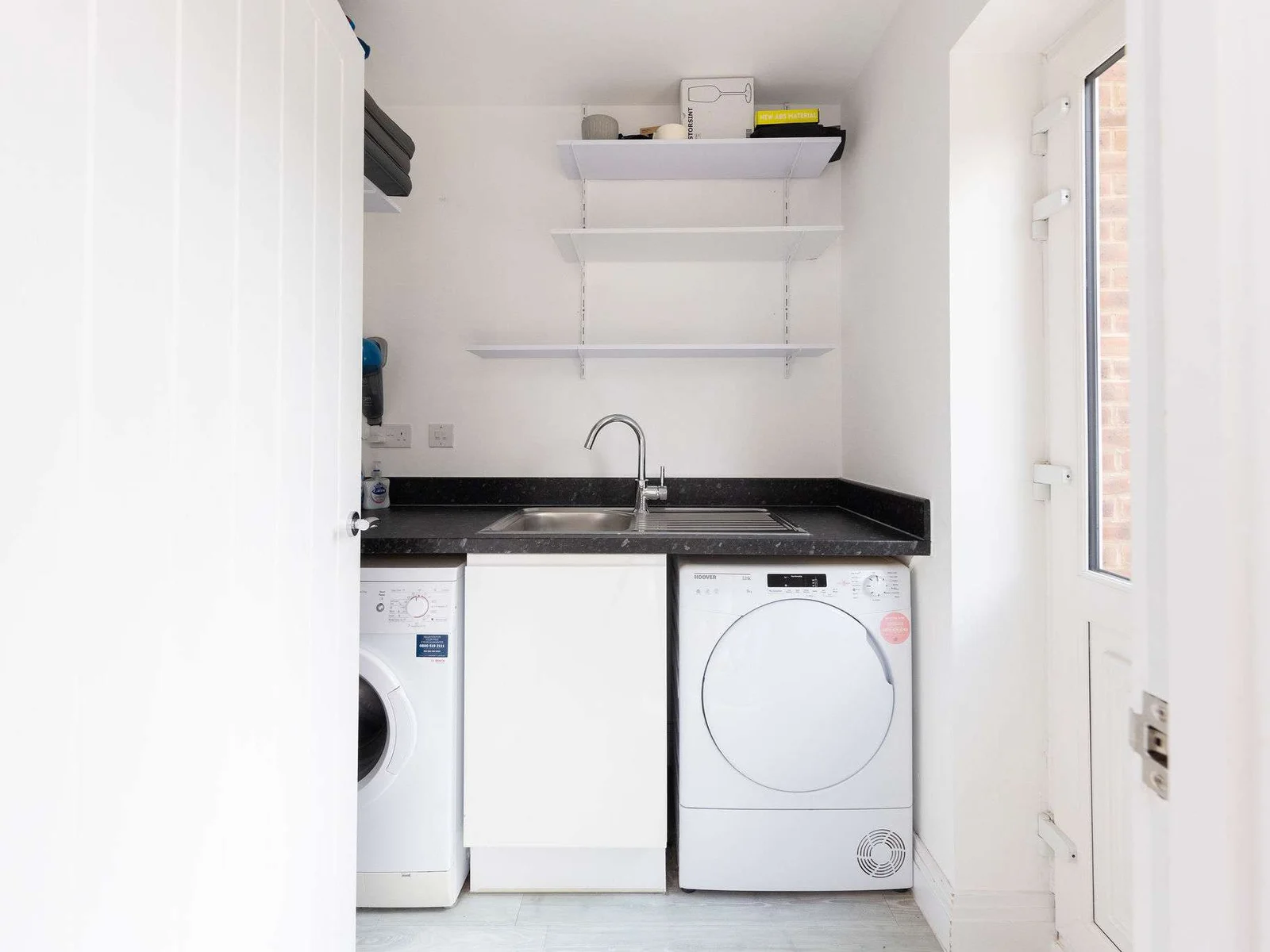 Enjoy the convenience of in-house laundry facilities, featuring a washer, dryer and sink, for a hassle-free stay.