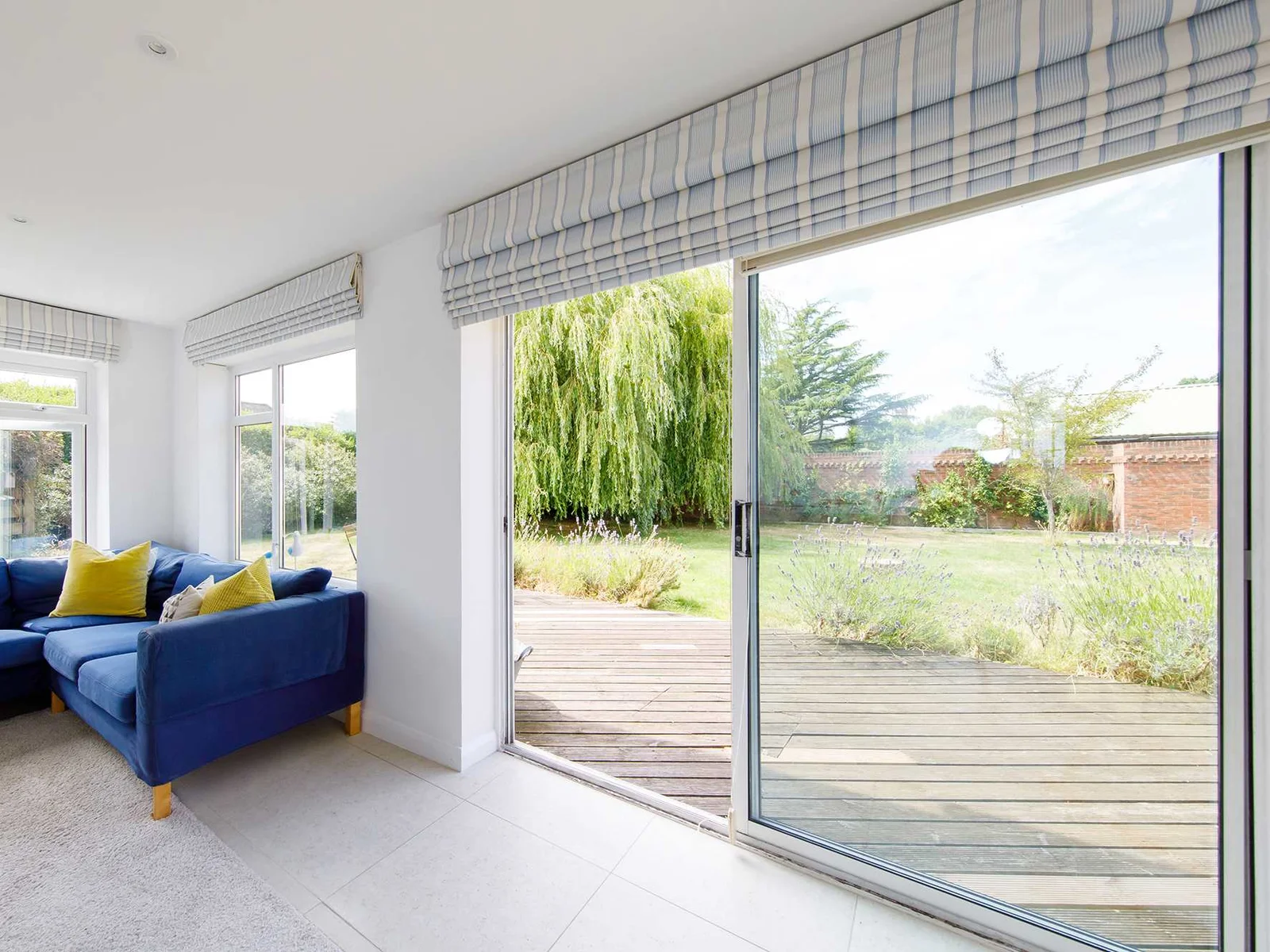 Open the sliding patio doors and let the fresh air breeze through.