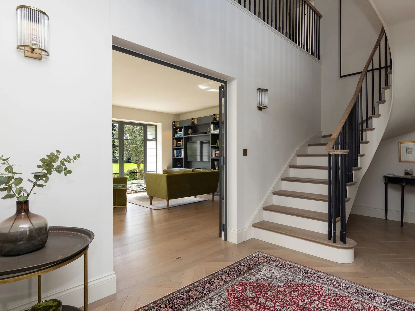 A bright, welcoming entrance sets the tone for this beautifully designed coastal retreat.