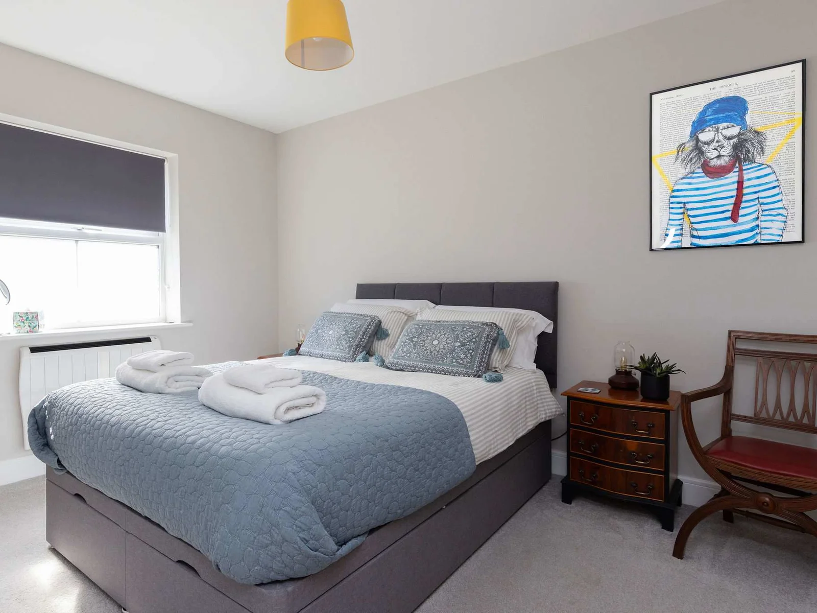 Bright king bedroom with ensuite, offering a comfortable and relaxing seaside getaway