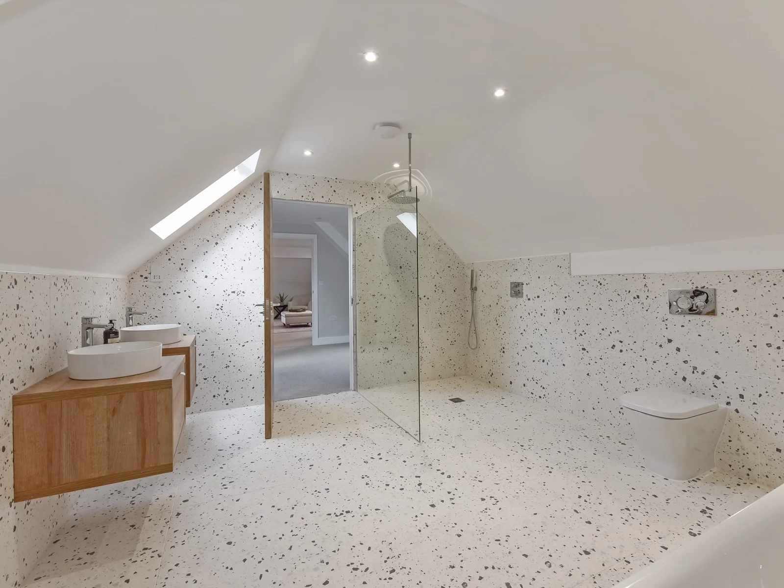 A bathroom with his & hers sinks.