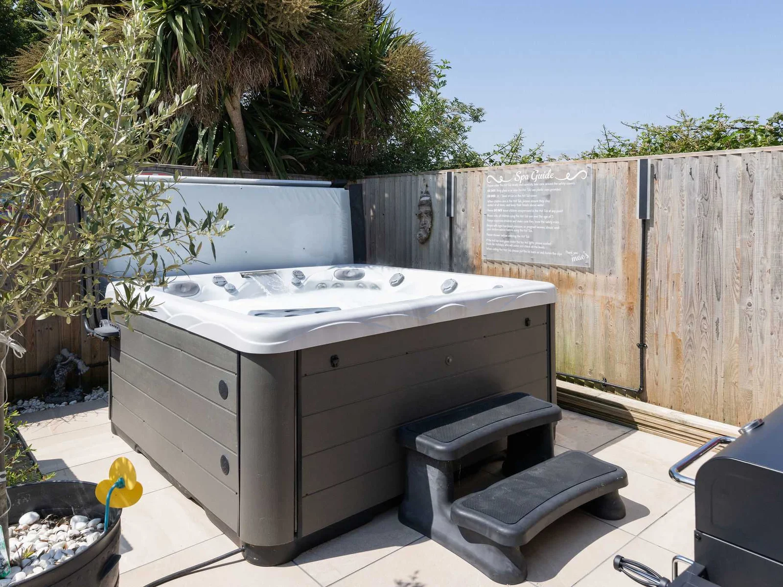 Soak and unwind in the 4-person hot tub