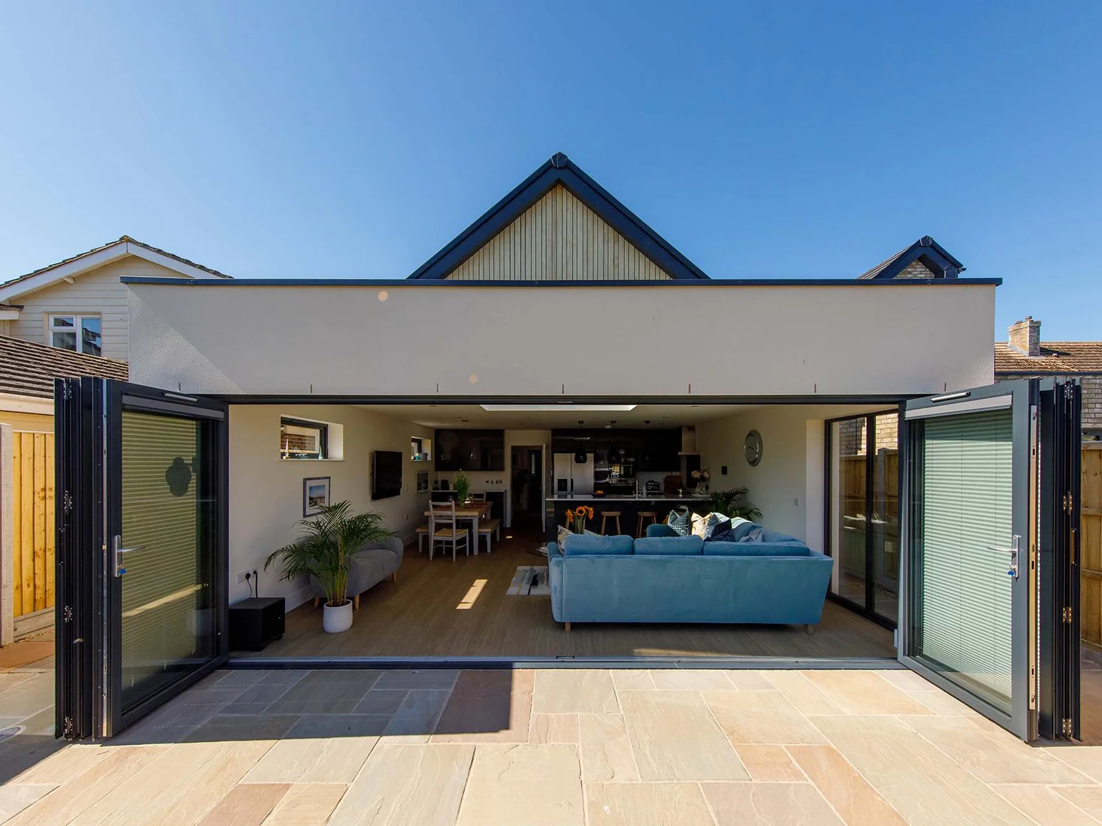 The bi-folds open up fully to connect the garden to the house.
