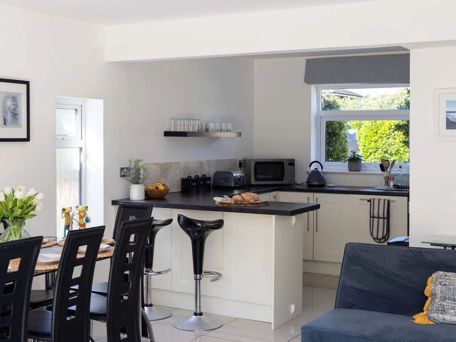 Prepare delicious meals in the modern, open plan kitchen of this relaxing holiday home.