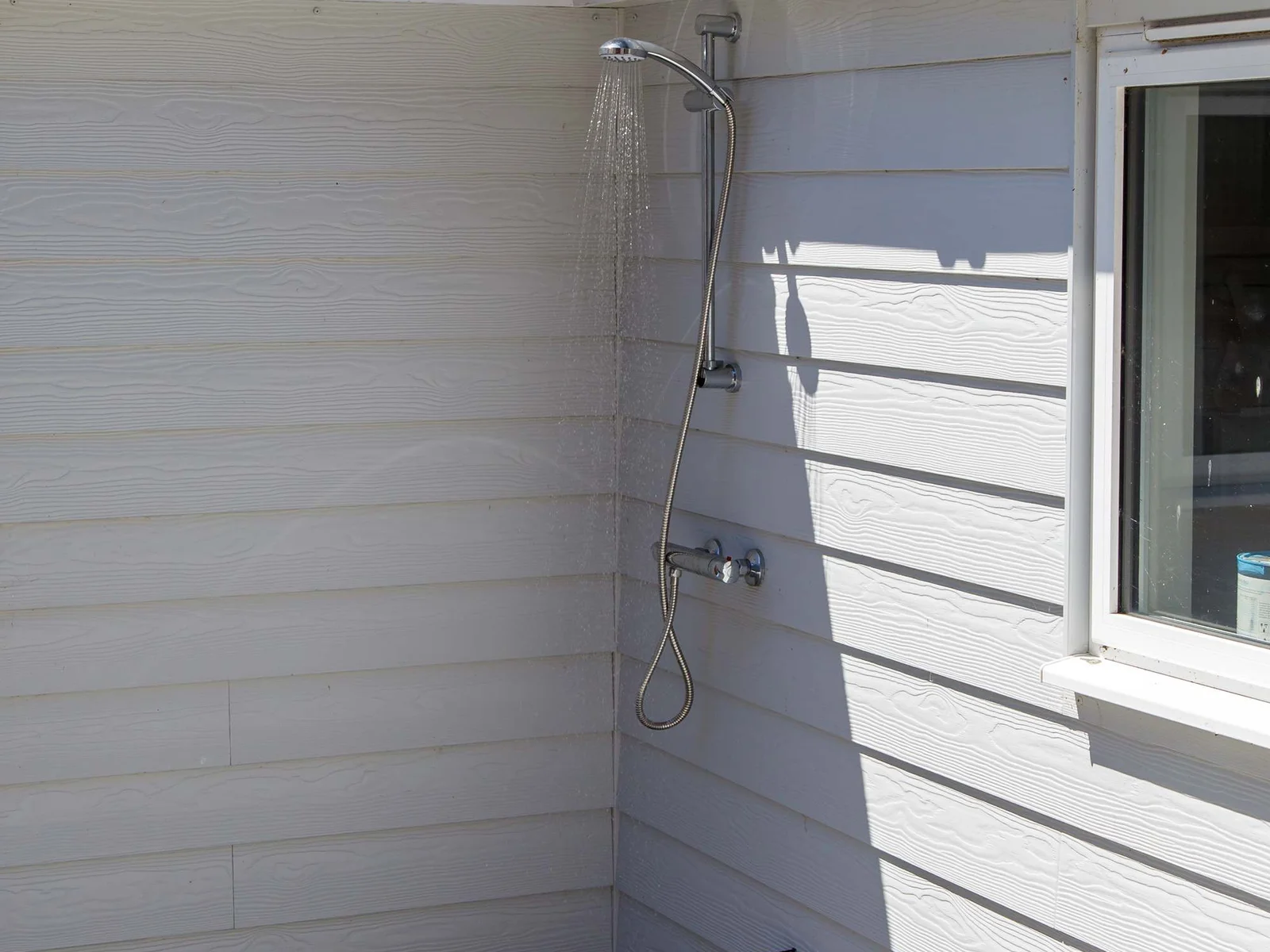 Rinse off under the outside shower after a day at the beach or a morning sea swim.