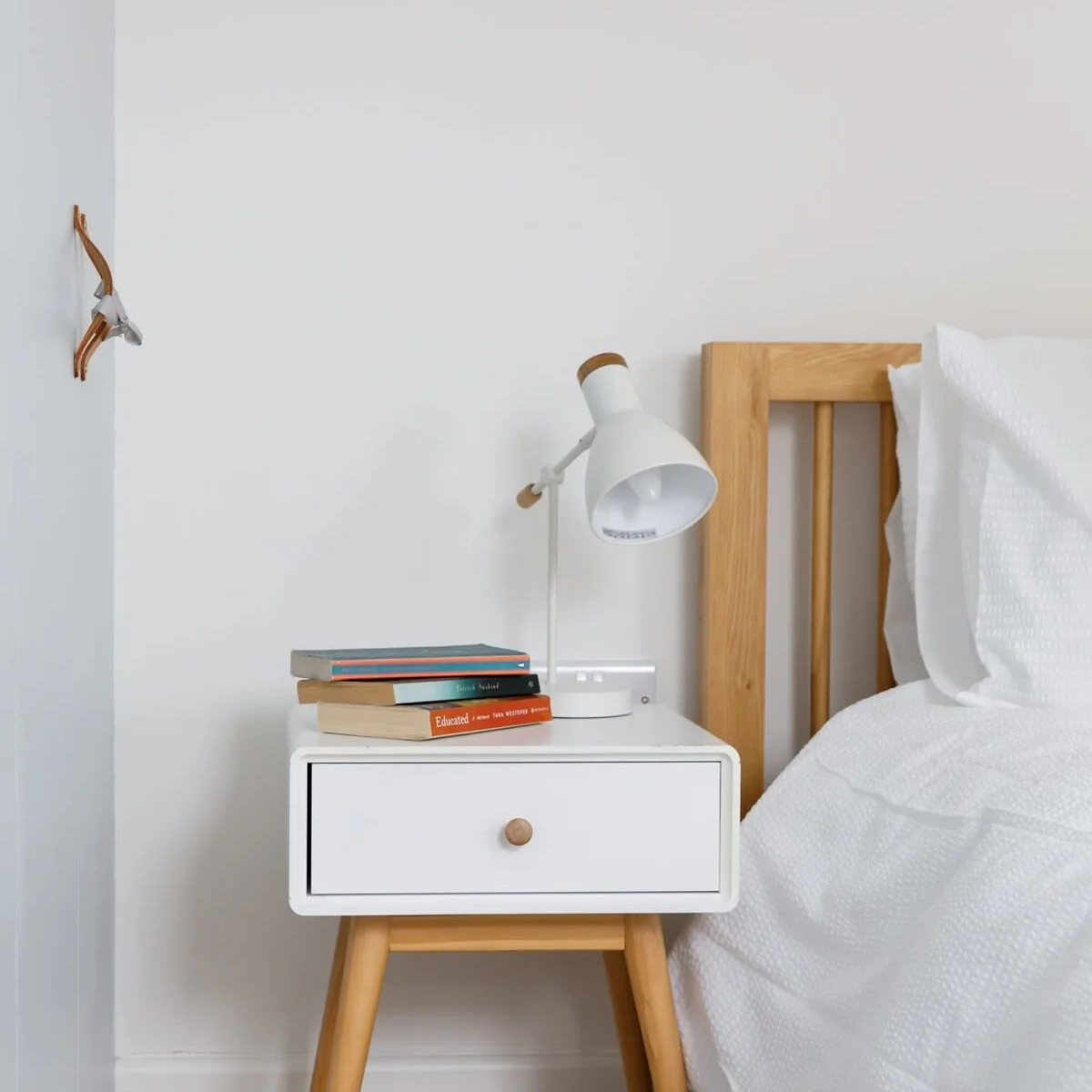 Reading lamps and bedside tables in all rooms.