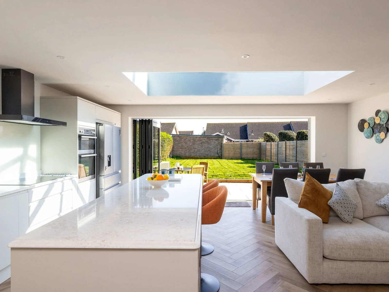 Light-filled open-plan space designed for comfort, ideal for relaxing and socialising during your coastal stay.