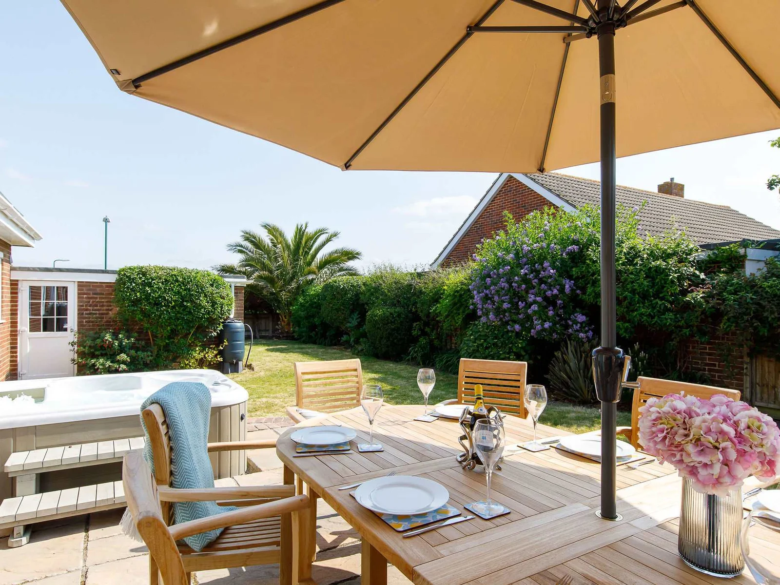 Enjoy alfresco dining on the sunny patio. Relax in the hot tub as the sun sets and watch the stars appear.