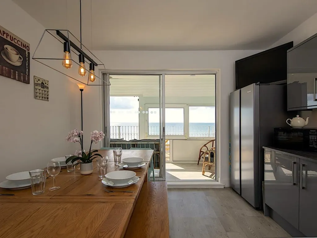 Stunning Beachfront Apt w/ Balcony & Sea Views