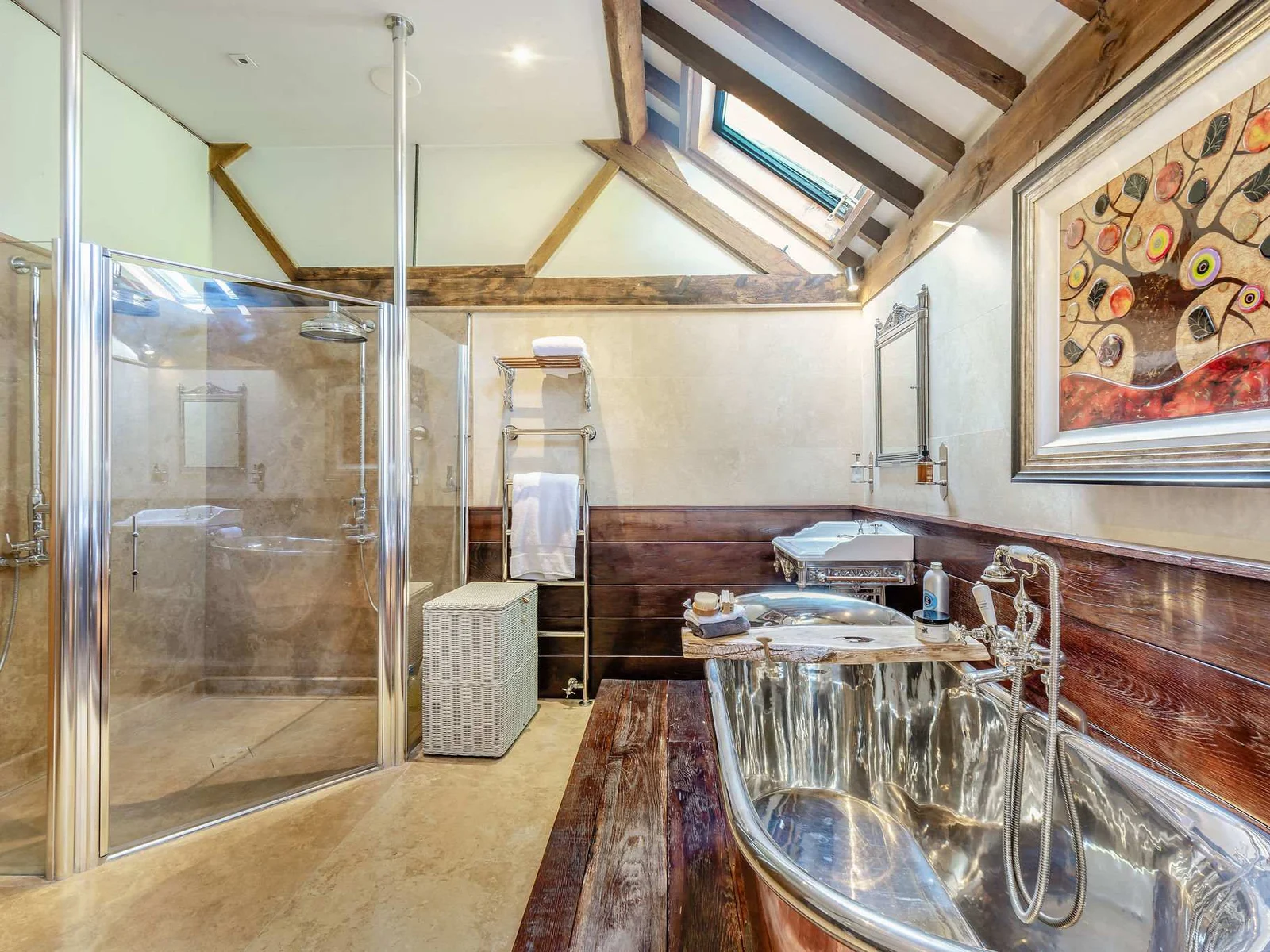 A luxurious master bathroom with a separate walk-in shower and statement copper bath.