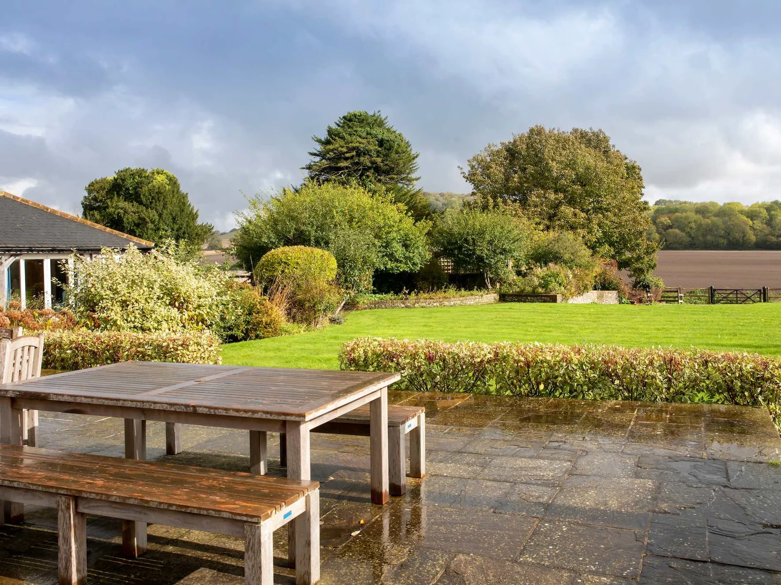 View from the patio out onto the garden onto the fields and downs, simply stunning!