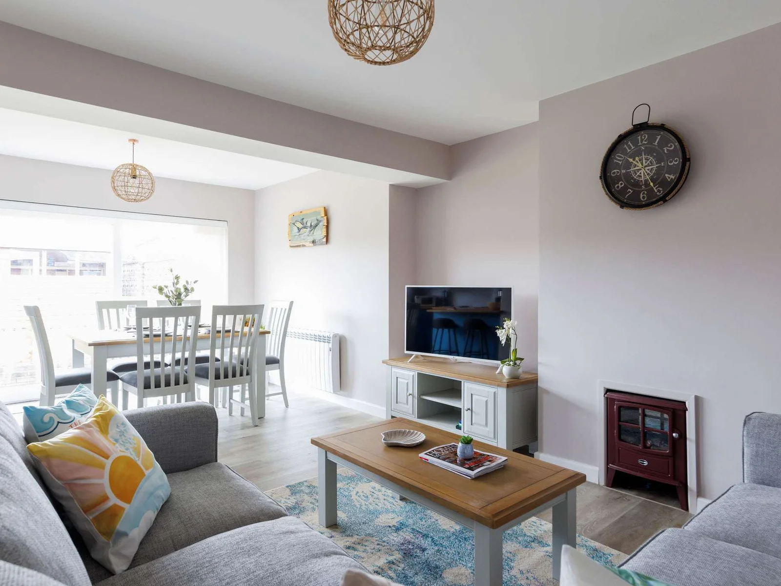 The home has a Smart TV and huge corner sofa for the whole family to enjoy a favourite TV show or film together.