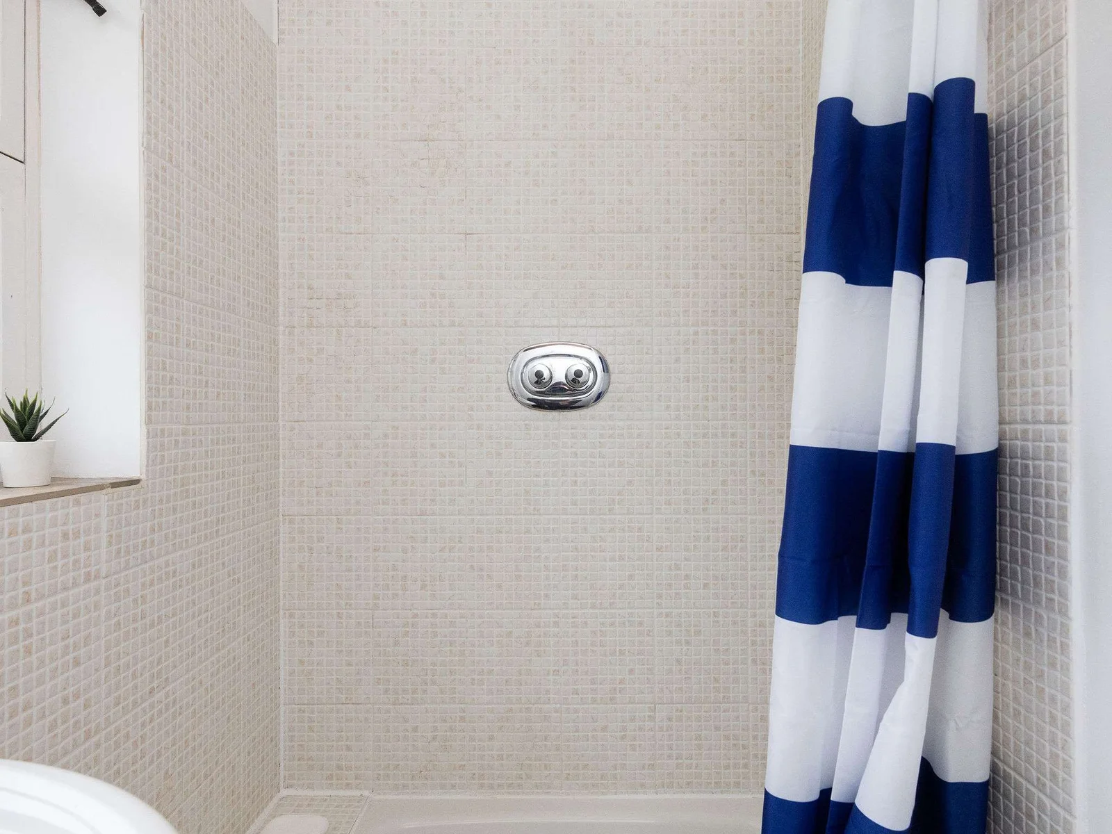 The family bathroom has a good sized shower.