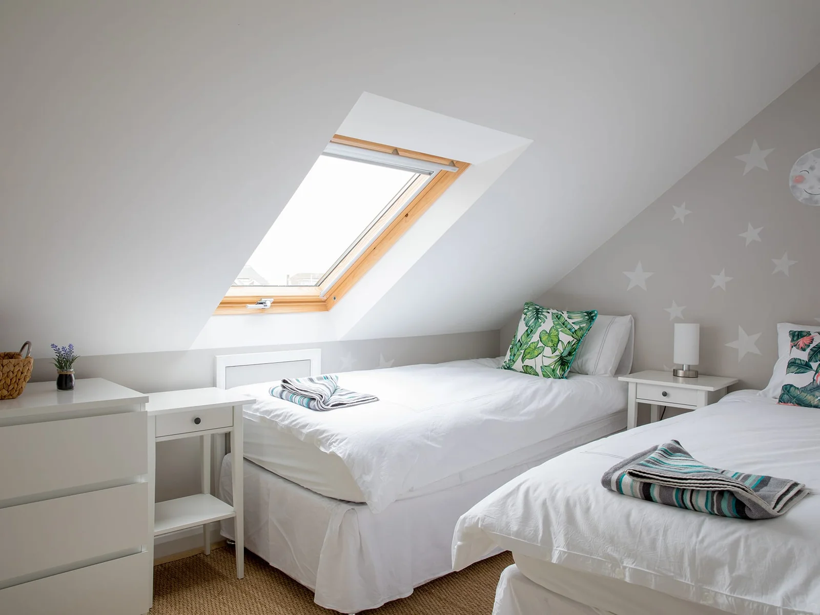 Comfy twin beds can be found in this bedroom.