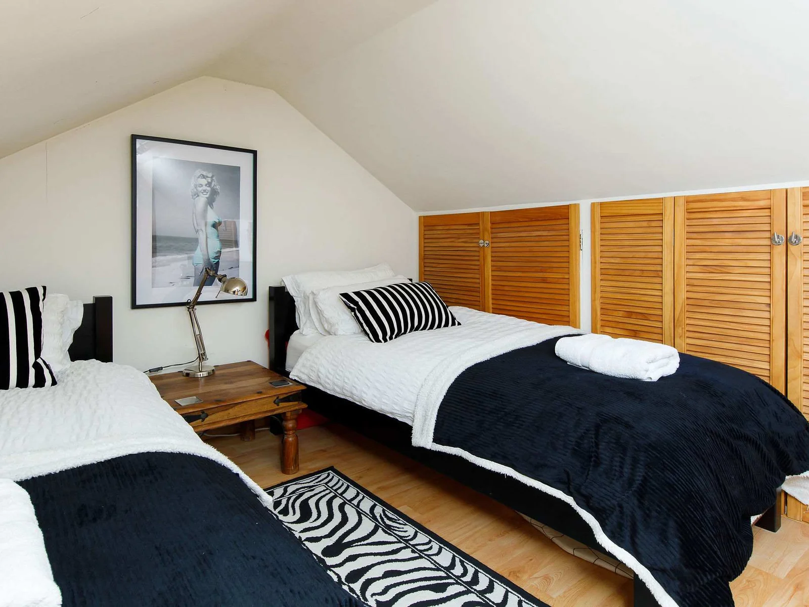 The twin has comfy mattresses and luxury bedding.