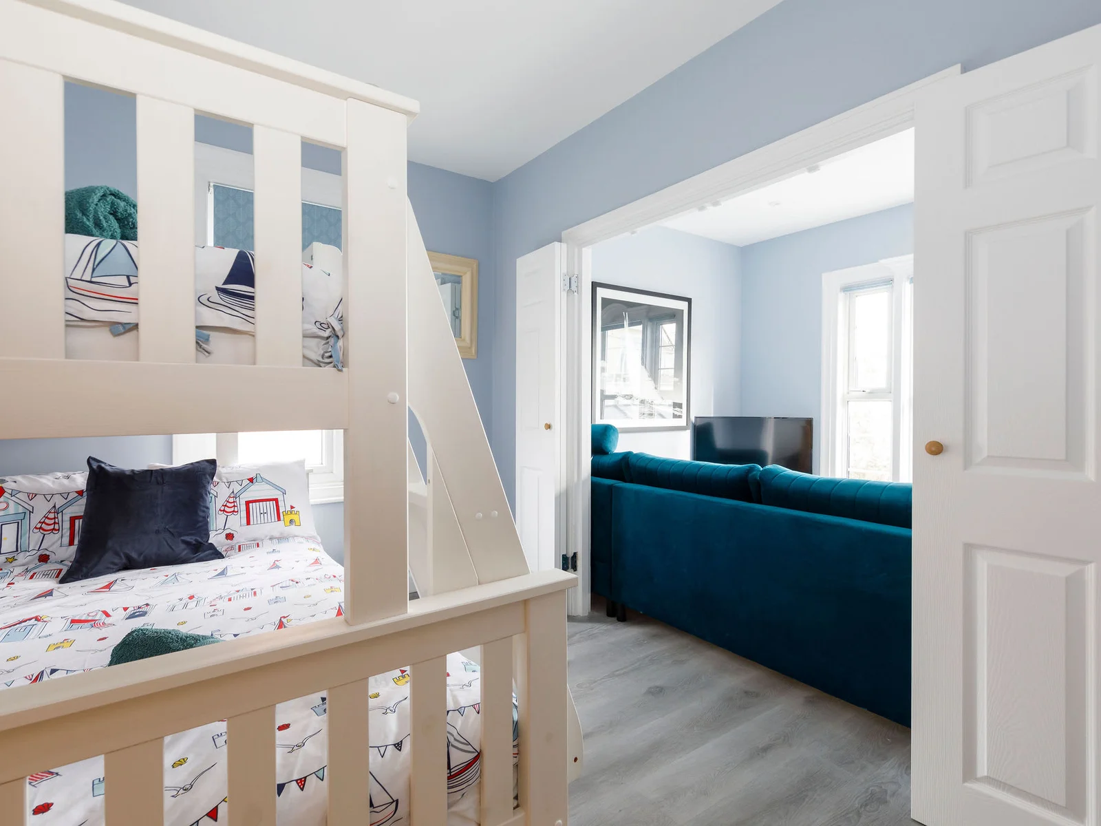 You can open the doors from the second bedroom to the lounge so you can wake up to those sea views!