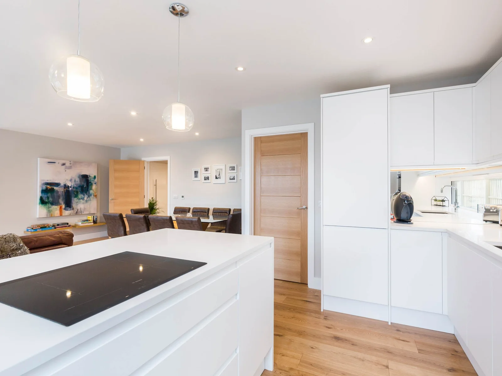 A view from the kitchen to the dining area