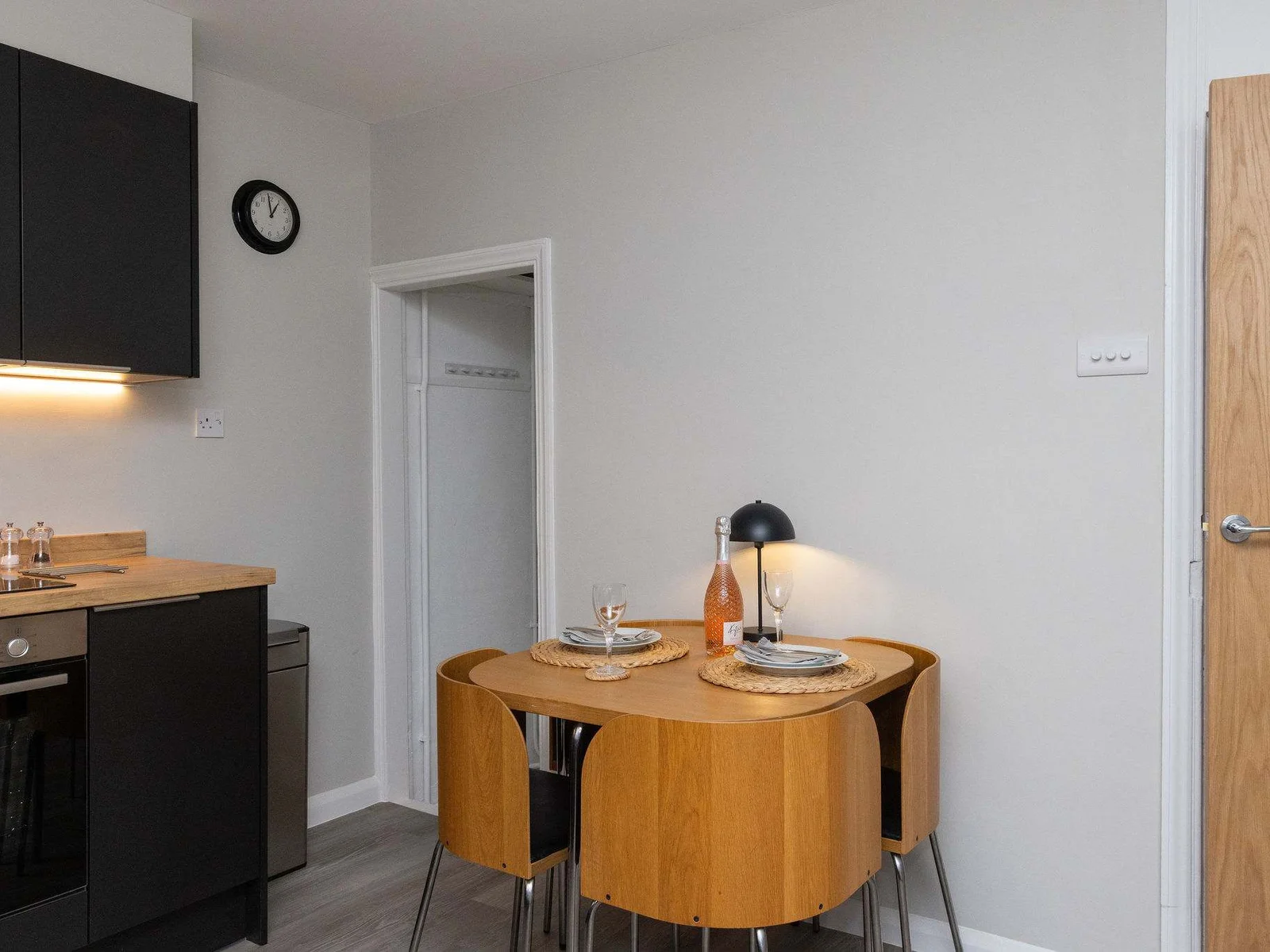 Sit down and enjoy your meals at this small table for 4 people.