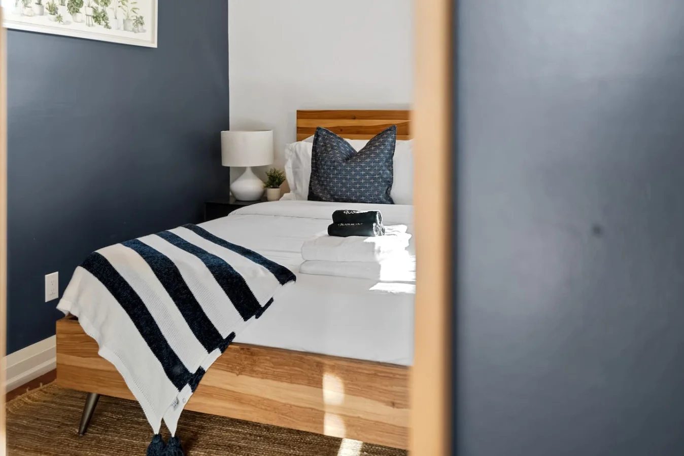 As you enter the bedroom, the comfortable bedding and peaceful atmosphere create the perfect retreat from the day.