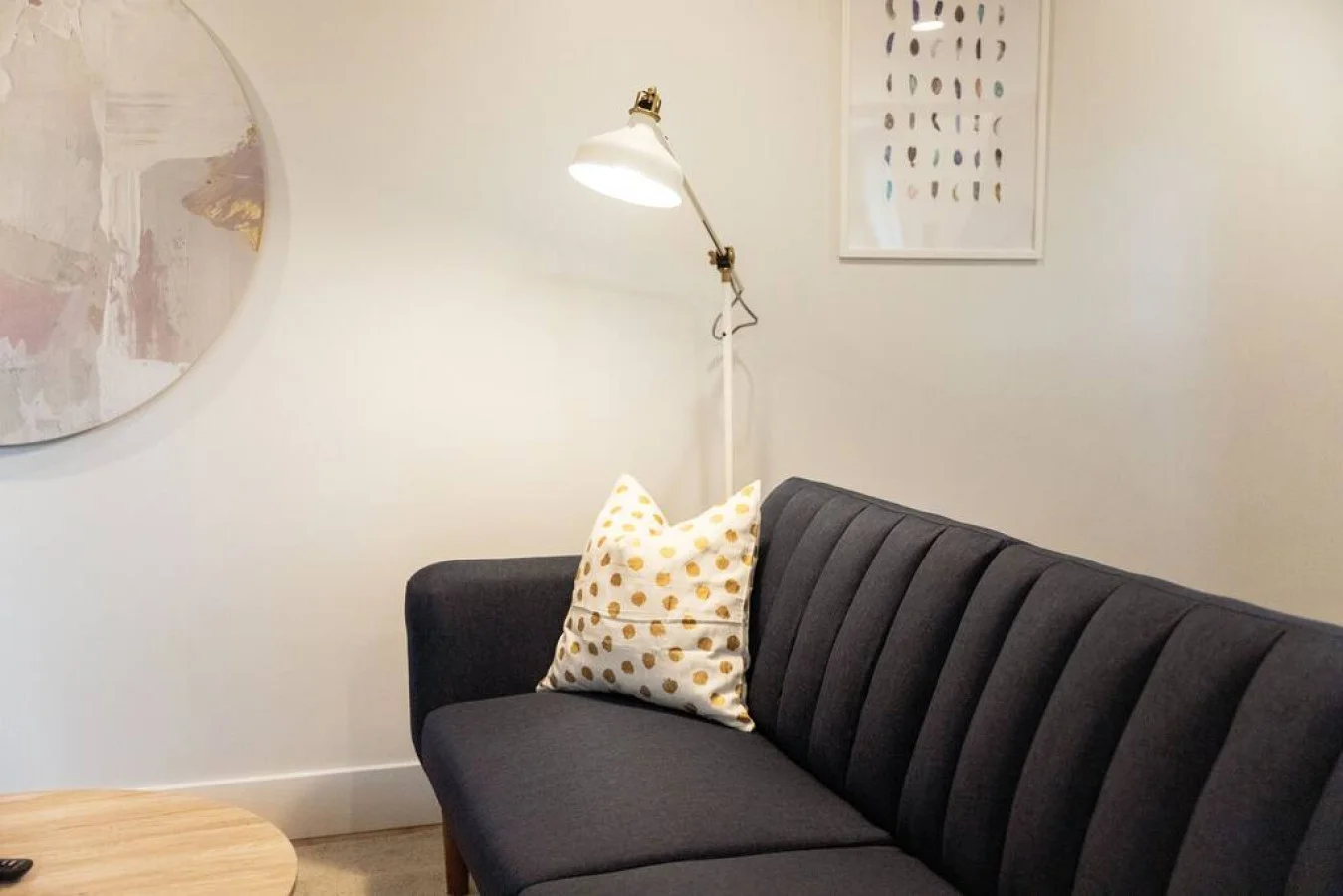 The living room’s cozy vibe makes it the perfect spot to relax, with ample seating and a warm ambiance.
