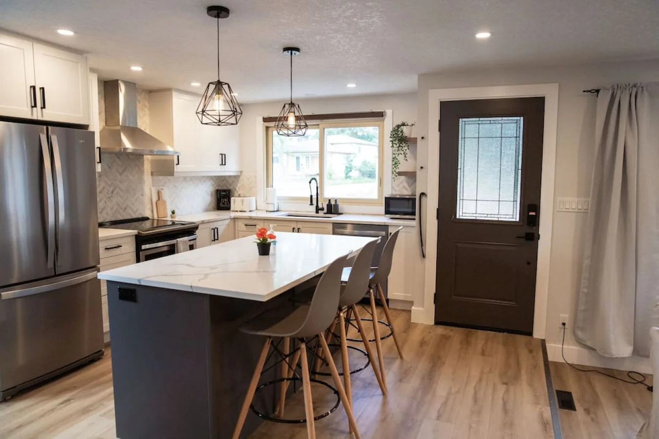 As you open the kitchen, you discover an assortment of coffee pods, and sugar, ensuring you have everything you need for a perfect morning or afternoon pick-me-up.