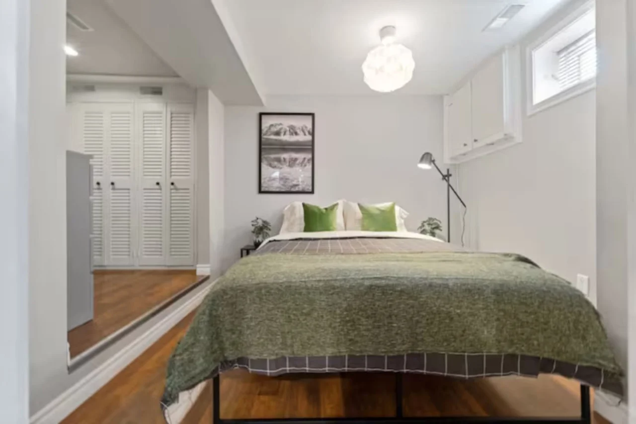 The bedroom’s serene ambiance invites you to relax, with a plush bed that promises a restful night's sleep.