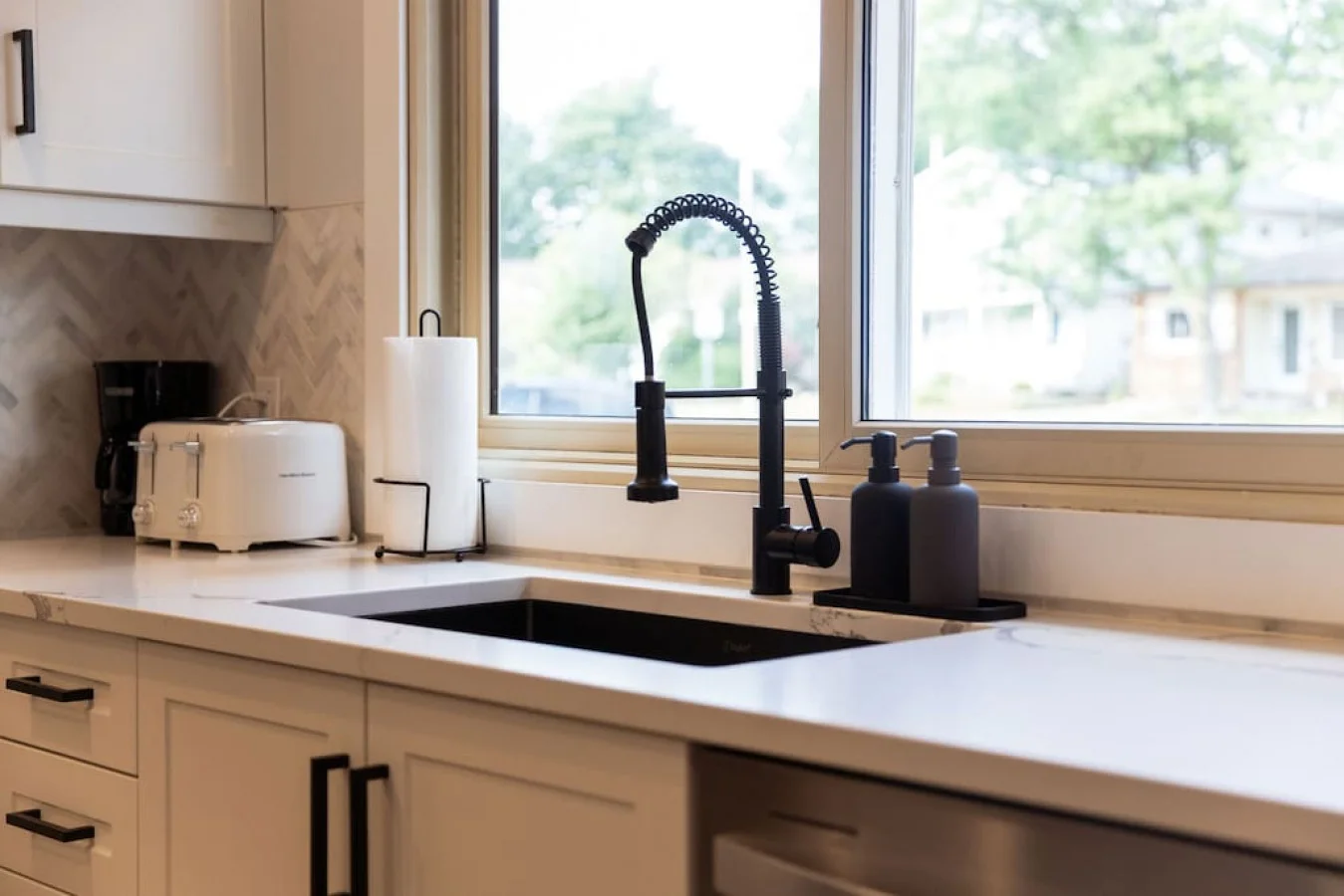 As you open the kitchen, you discover an assortment of coffee pods, and sugar, ensuring you have everything you need for a perfect morning or afternoon pick-me-up.