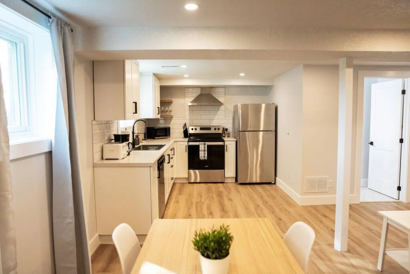 As you open the kitchen, you discover an assortment of coffee pods, and sugar, ensuring you have everything you need for a perfect morning or afternoon pick-me-up.
