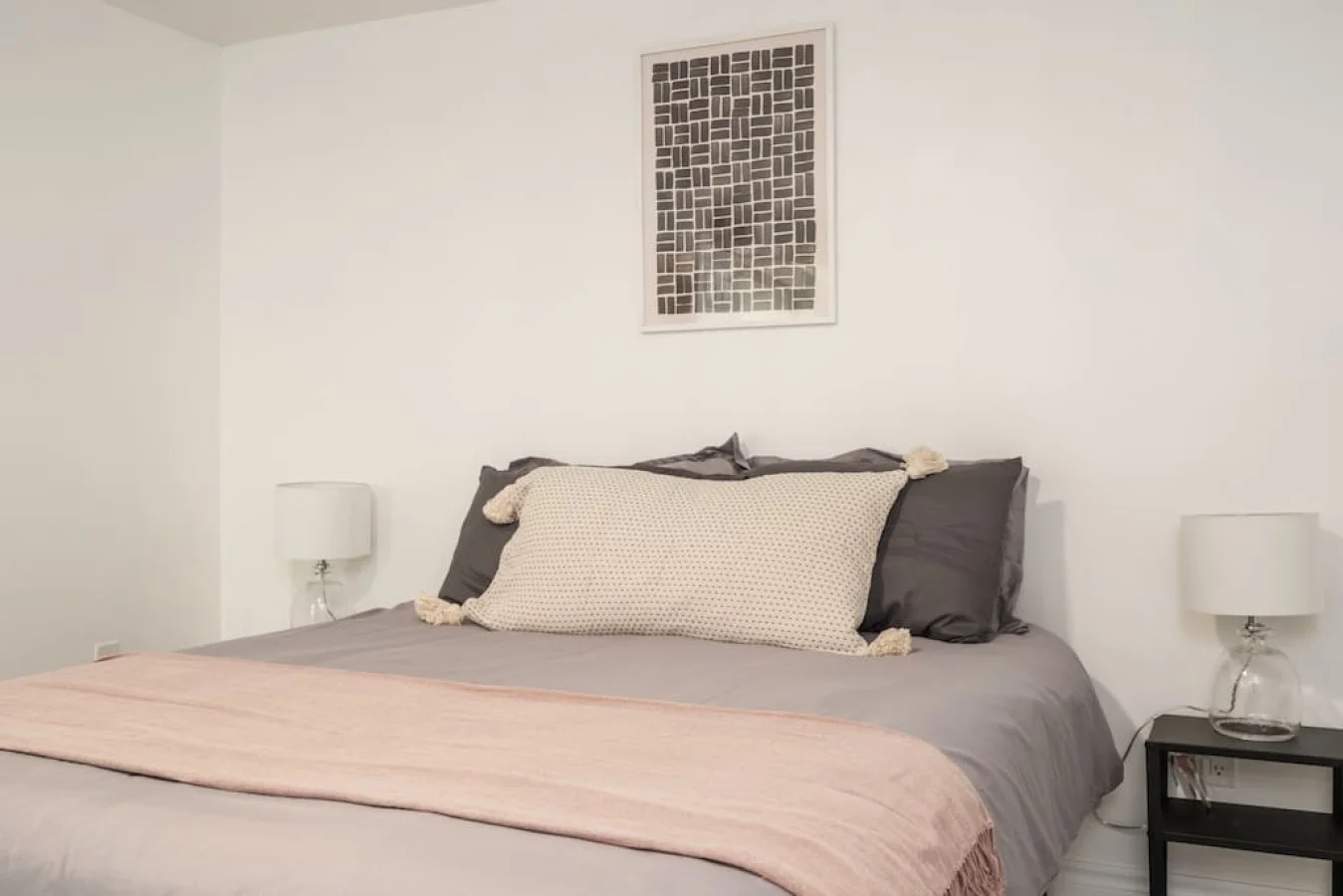 Spacious bedroom with stylish decor, perfect for unwinding after a day of exploring the local area.
