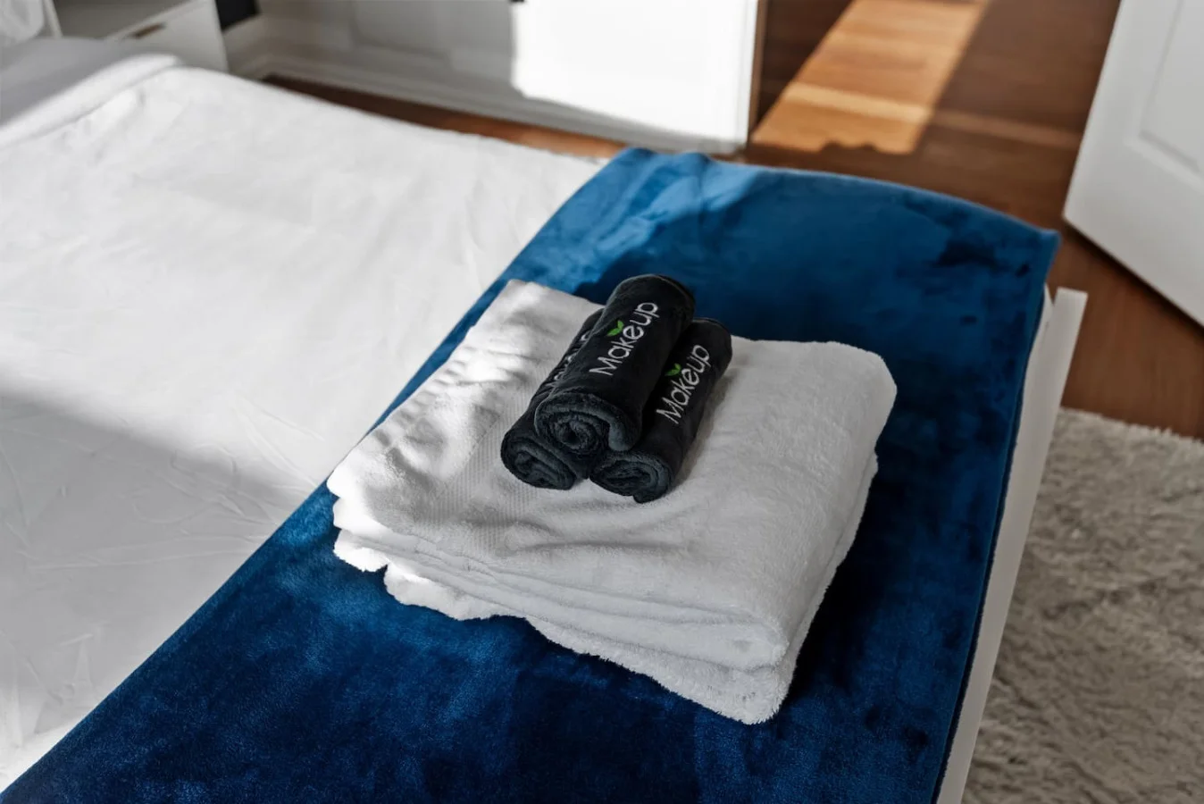The bedroom offers a luxurious retreat, with a bed that promises restful nights and a room that feels like a private oasis.