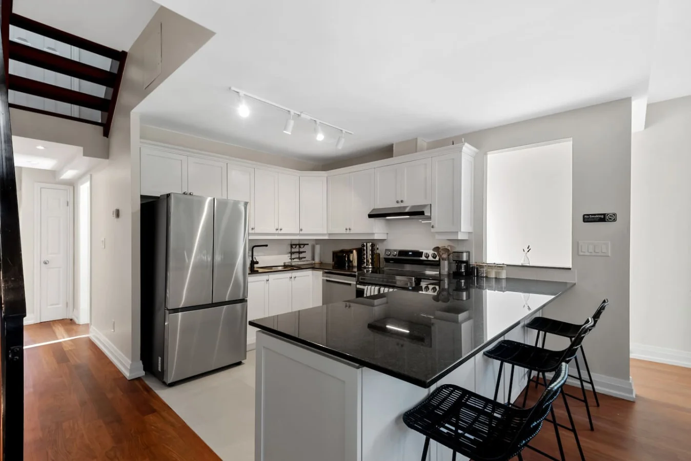 The dining area invites you to savor every moment, whether enjoying a quiet meal or hosting a festive gathering.