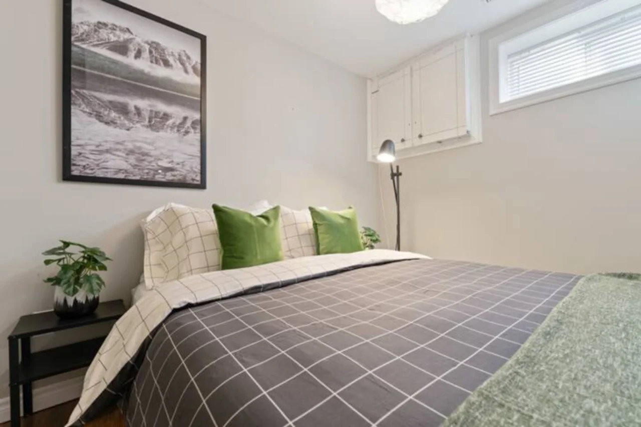 Spacious bedroom with stylish decor, perfect for unwinding after a day of exploring the local area.
