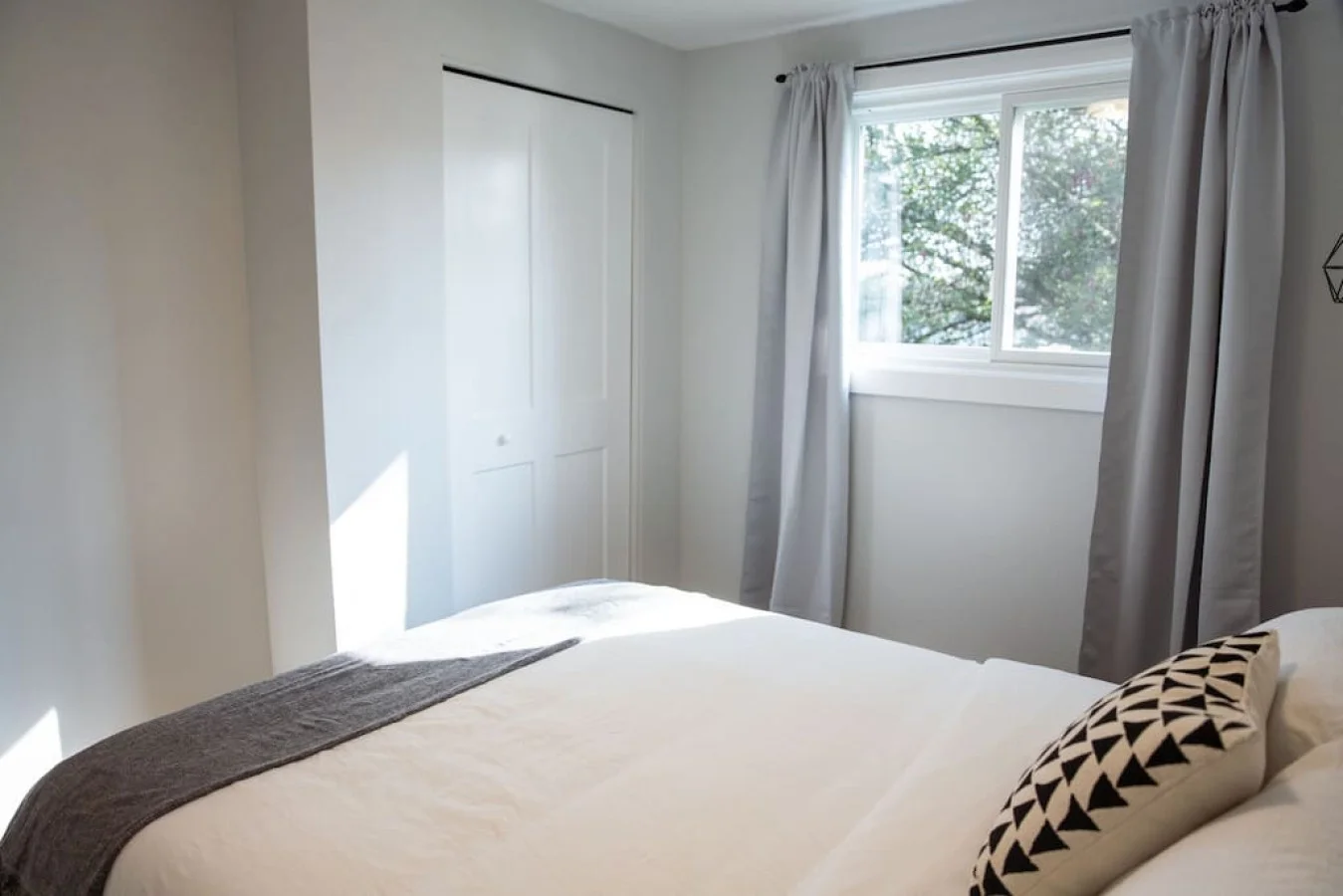 As you enter the bedroom, the comfortable bedding and peaceful atmosphere create the perfect retreat from the day.