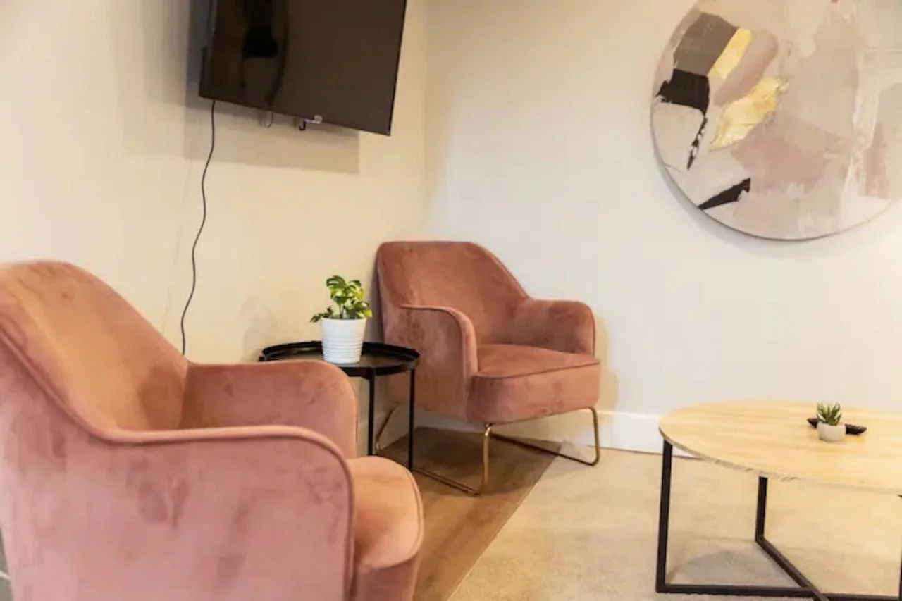 Once you enter the living room you'll find a space that feels both luxurious and cozy, perfect for unwinding after a long day.