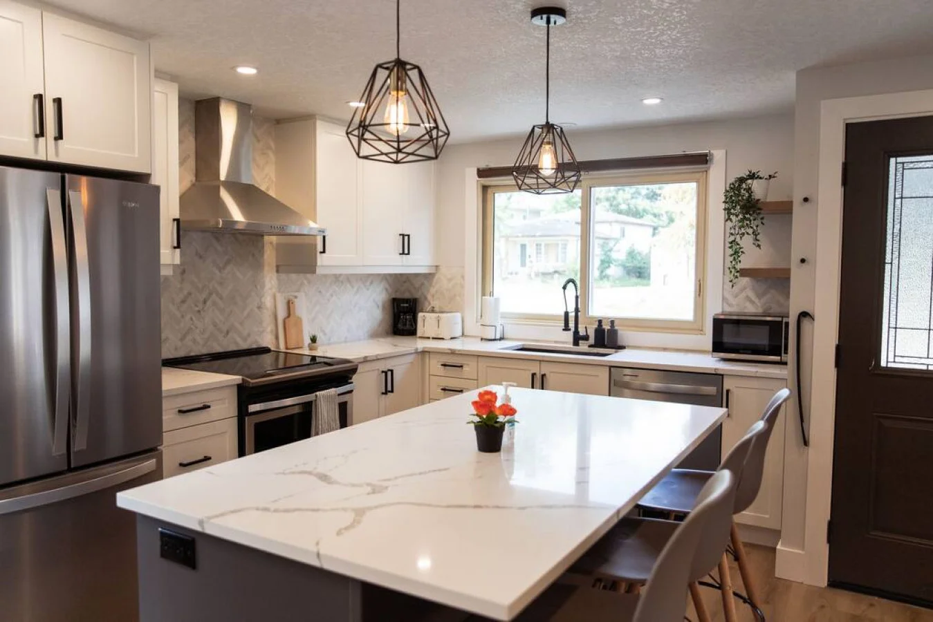 The spacious dining room invites you to savor every moment, whether enjoying a quiet meal or hosting a festive gathering.