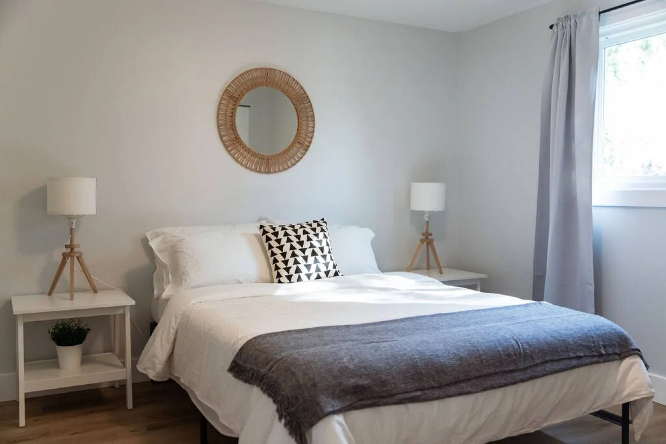 The bedroom’s serene ambiance invites you to relax, with a plush bed that promises a restful night's sleep.
