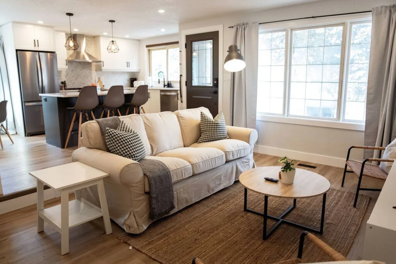 You feel at home as you settle into the living room, where the inviting atmosphere is perfect for lounging or entertaining.