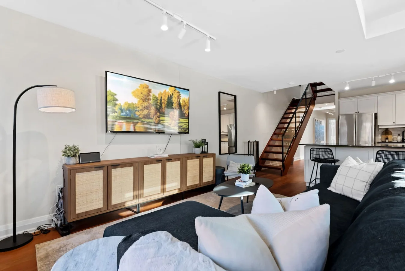 Once you enter the living room you'll find a space that feels both luxurious and cozy, perfect for unwinding after a long day.