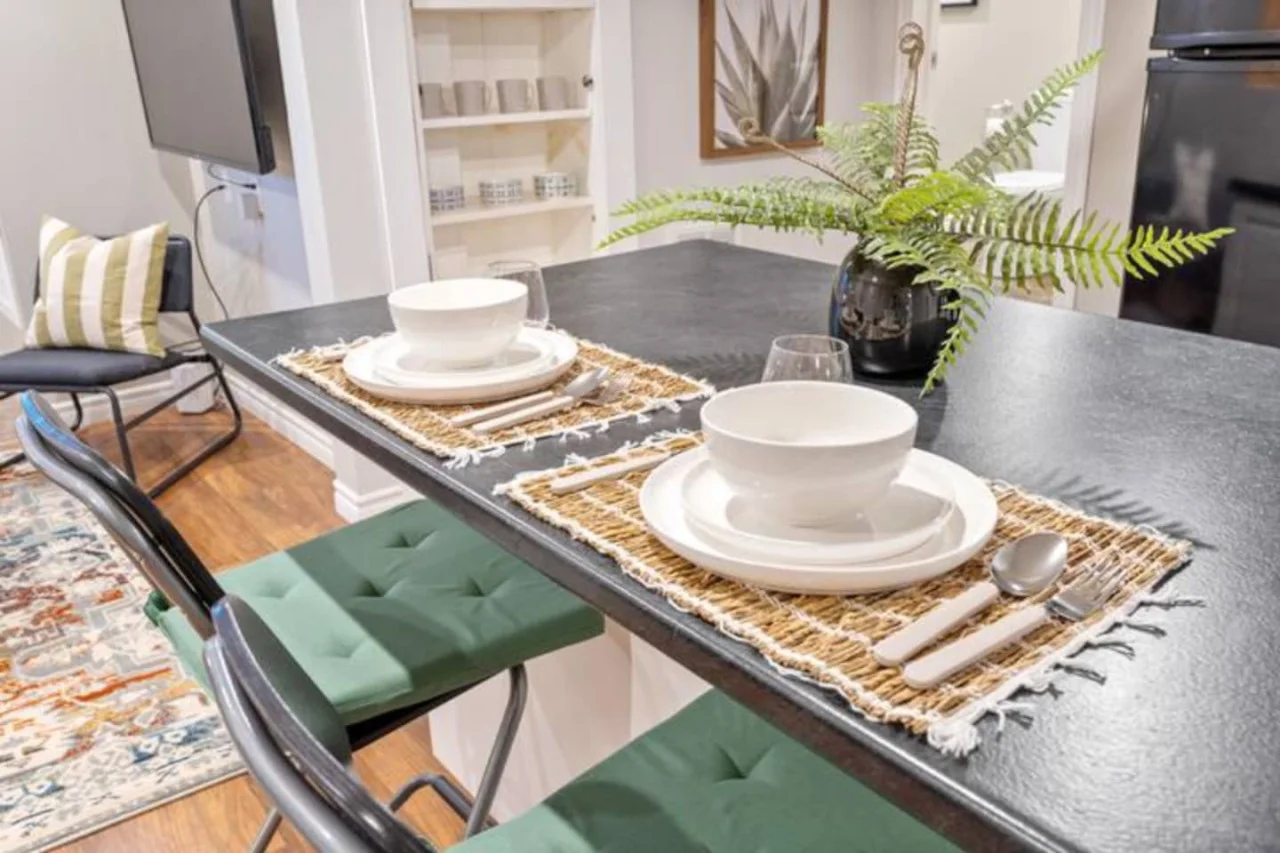 The dining area invites you to savor every moment, whether enjoying a quiet meal or hosting a festive gathering.
