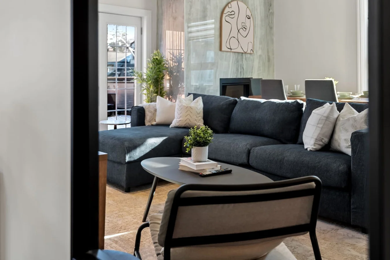 As you take a seat in the living room, the comfortable furniture and tasteful design make it easy to unwind.