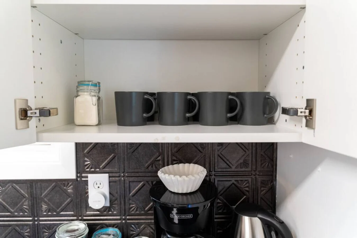 As you approach kitchen the elegant layout and well-stocked shelves make it the ideal spot to relax.